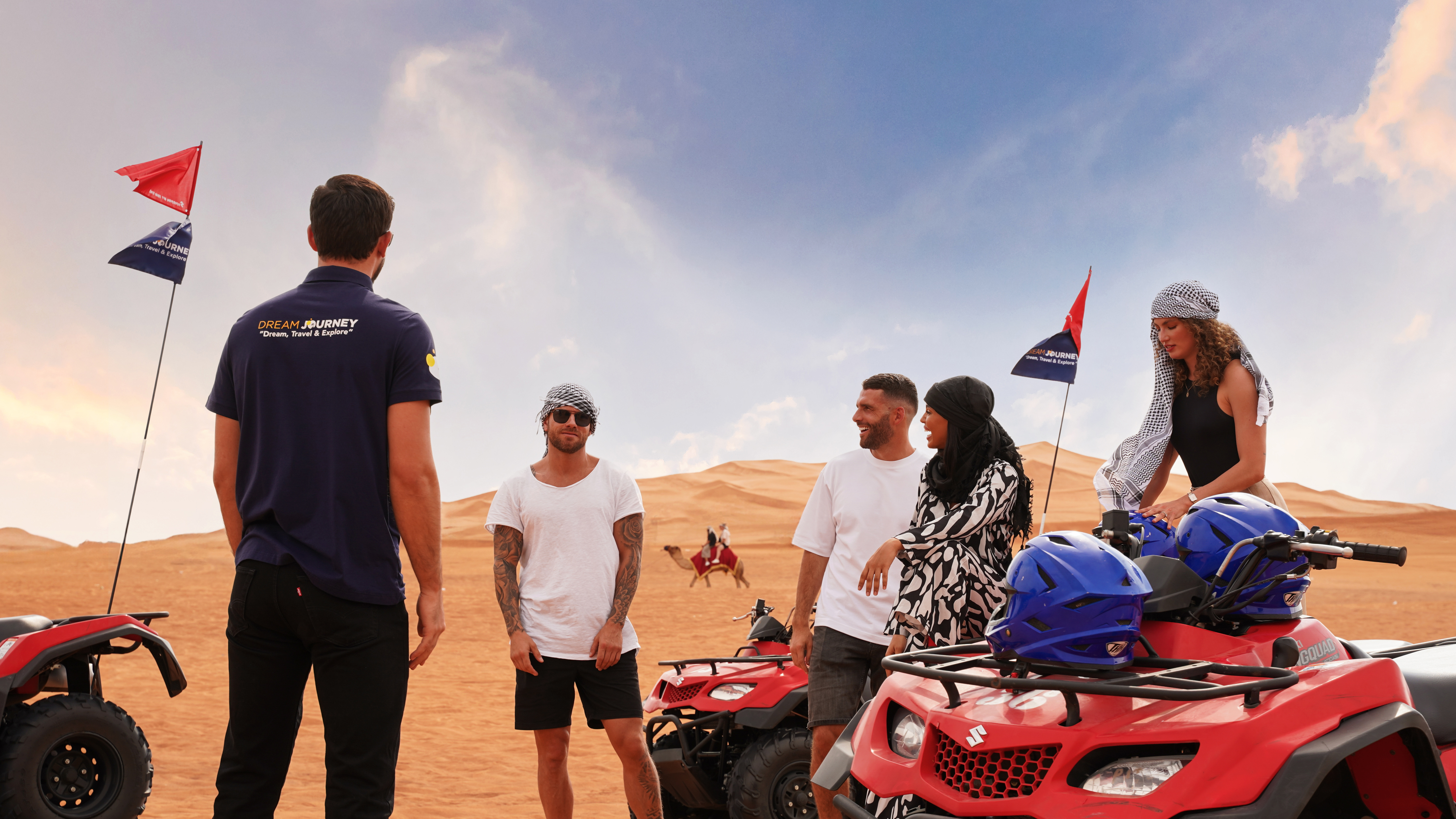 Exciting quad bike ride during small group guided red dune safari with BBQ