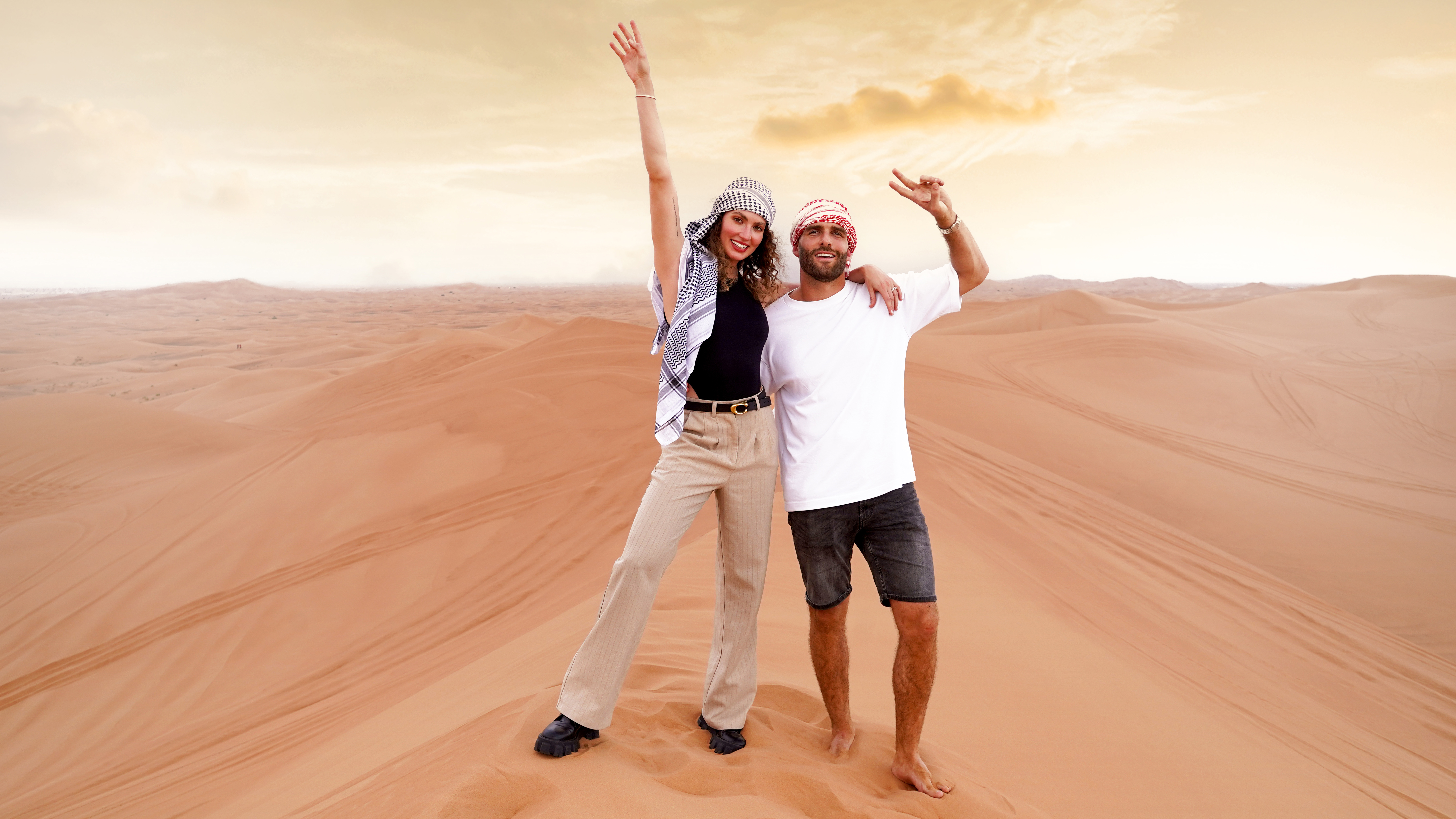 Camel ride in the red dunes of Dubai during a premium safari experience