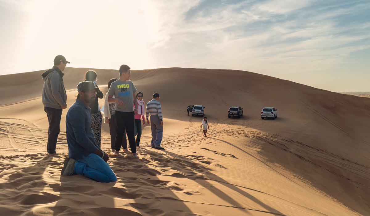 Exciting quad bike ride during small group guided red dune safari with BBQ